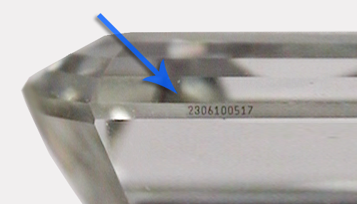 Report number inscription on a diamond's girdle